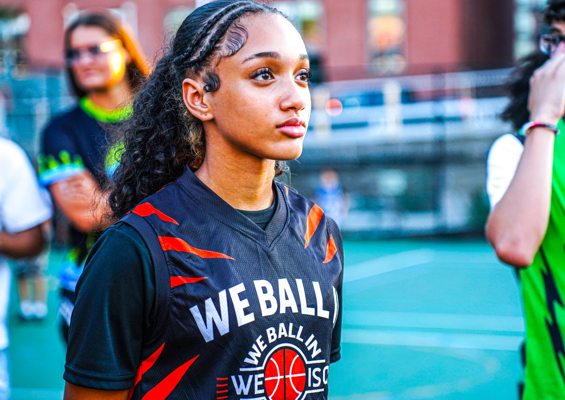 Focused basketball player in black jersey
